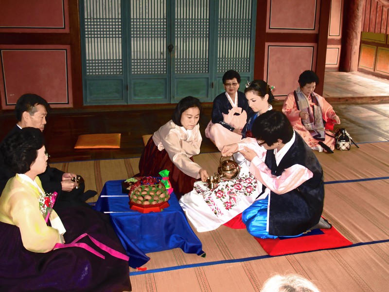 Korean Traditional Wedding Ceremony: Multicultural Couple, Family. Hanbok. Paebaek Ceremony