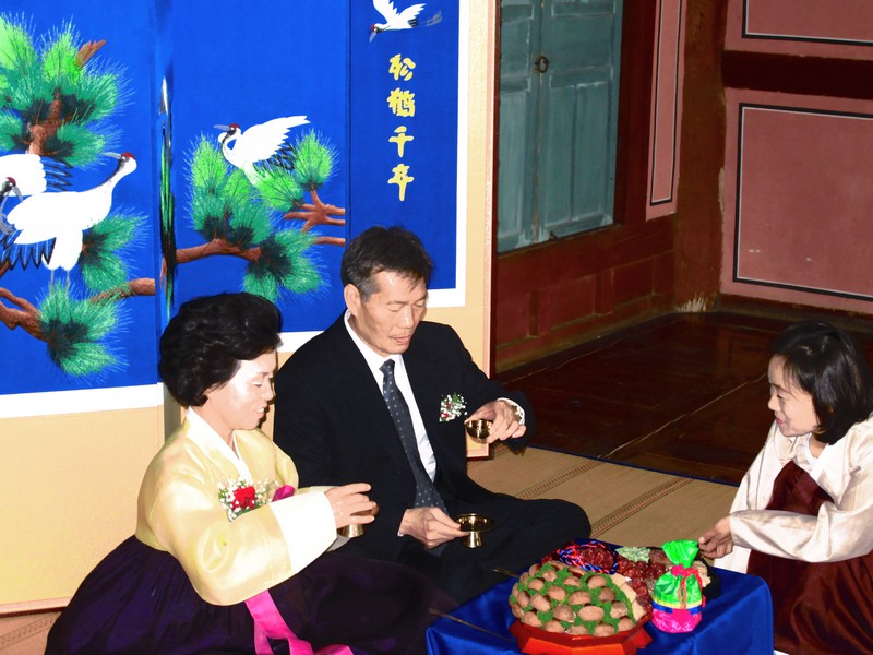 Korean Traditional Wedding Ceremony: Multicultural Couple, Family. Hanbok. Paebaek Ceremony