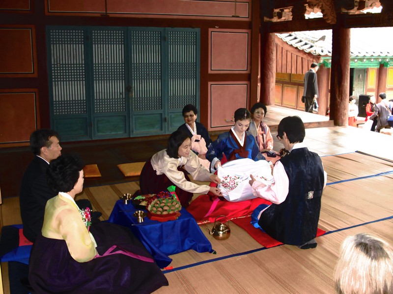 Korean Traditional Wedding Ceremony: Multicultural Couple, Family. Hanbok. Paebaek Ceremony