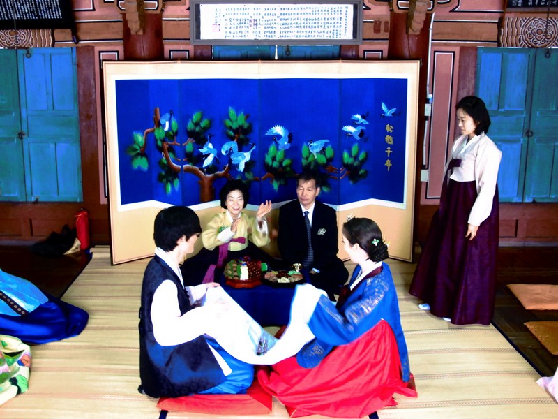 Korean Traditional Wedding Ceremony: Multicultural Couple, Family. Hanbok. Paebaek Ceremony