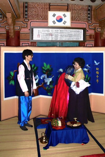 Korean Traditional Wedding Ceremony: Multicultural Couple, Family. Hanbok. Paebaek Ceremony