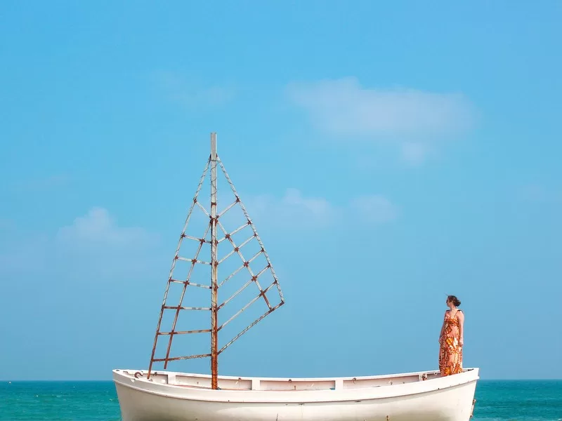 Jeju-do, Korea; standing on a boat