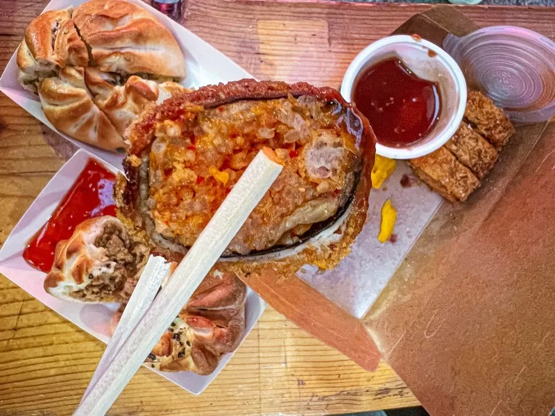 Seogwipo Maeil Olle Market (서귀포매일올레시장), Seogwipo-si, Jeju-do, Korea; Korean food, Black Pork Cutlet Roll (흑돼지 고사리 롤카츠), Four Streets Olle (네거리올레)