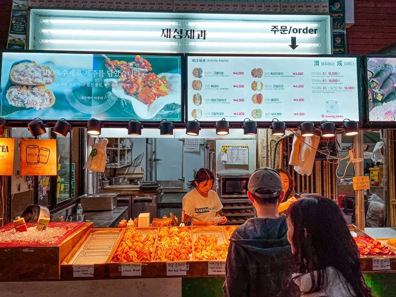 Seogwipo Maeil Olle Market (서귀포매일올레시장), Seogwipo-si, Jeju-do, Korea; Korean food, Black Pork Bread (한림흑돼지), Jeseong Bakery (제송제과)