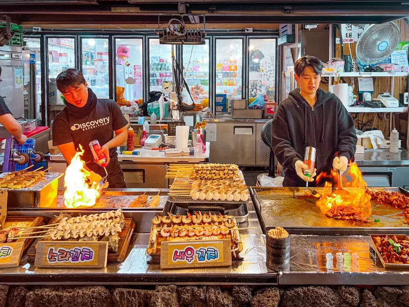 Seogwipo Maeil Olle Market (서귀포매일올레시장), Seogwipo-si, Jeju-do, Korea; Korean food, Grilled Black Pork (흑돼지철판구이)