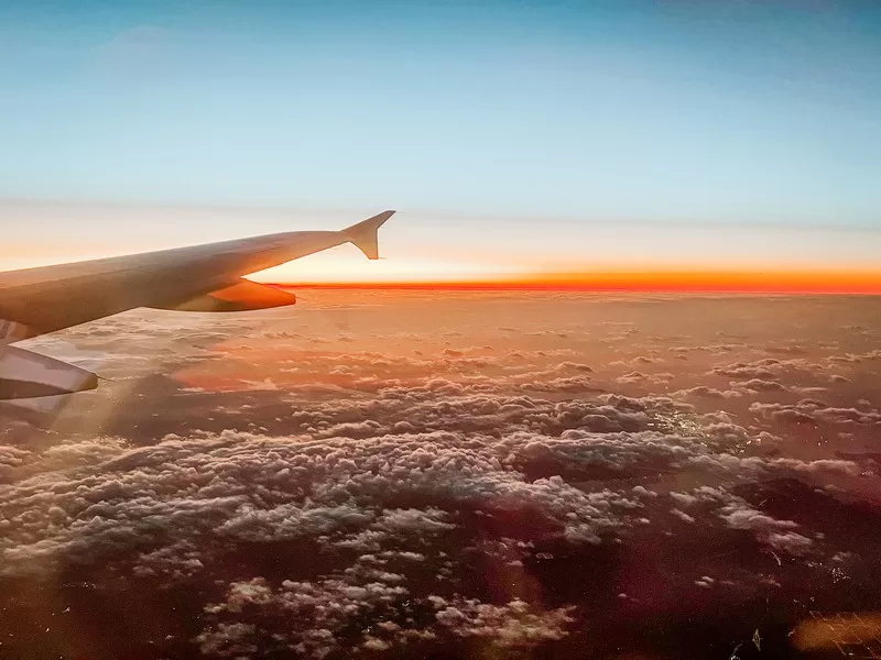 view from Airplane window, sunset out airplane window