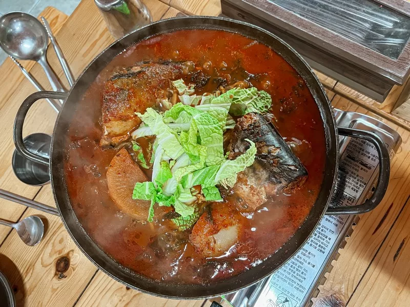 Galchi Jorim (갈치조림), Cutlassfish (Galchi (갈치)), Samshin Halmang's Table (삼신할망밥상), Pyoseon-myeon, Seogwipo-si, Jeju-do, Korea; Korean food, Jeju food