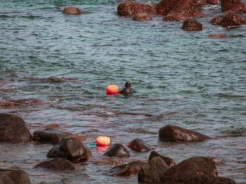 Seongsan Ilchulbong (성산일출봉), Seogwipo-si, Jeju-do, Korea; haenyeo, Korean women divers